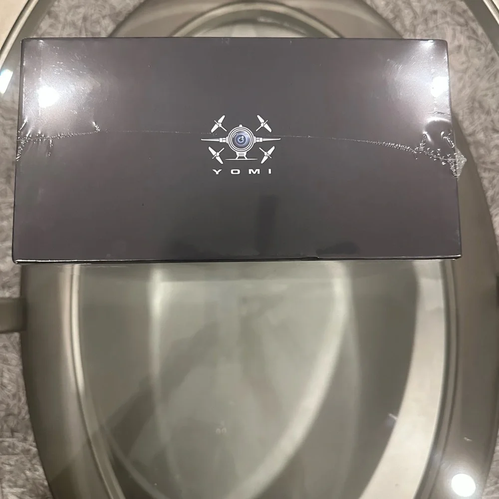 Sleek Black Drone with Advanced Obstacle Avoidance